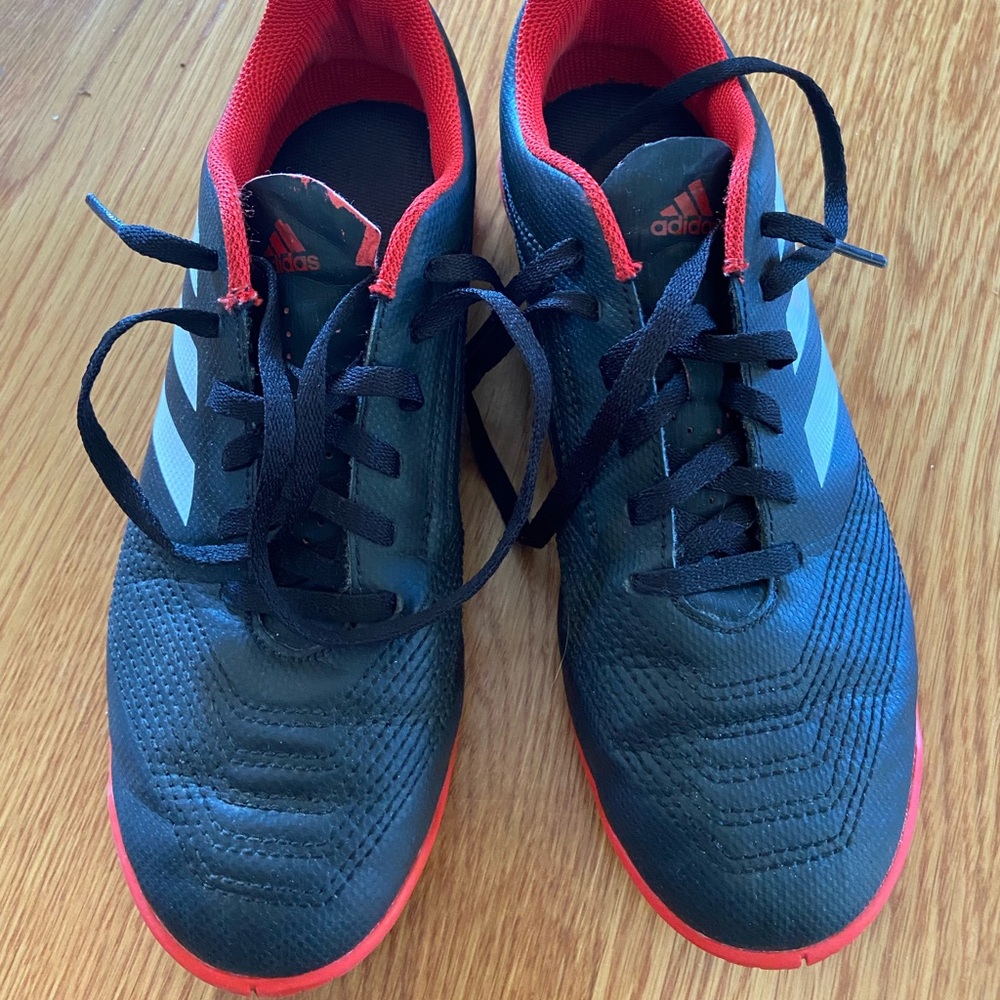 Adidas predator youth futsal (indoor soccer) shoes.